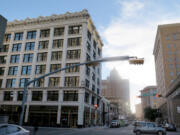 Cars pass through downtown El Paso, Texas, which is undergoing a major facelift as it tries to attract new residents and more visitors. The city is preparing for the Feb. 17 visit of Pope Francis to neighboring Ciudad Juarez, Mexico. City officials expect tens of thousands of visitors to the city even though the Pope will stay in Juarez, Mexico.