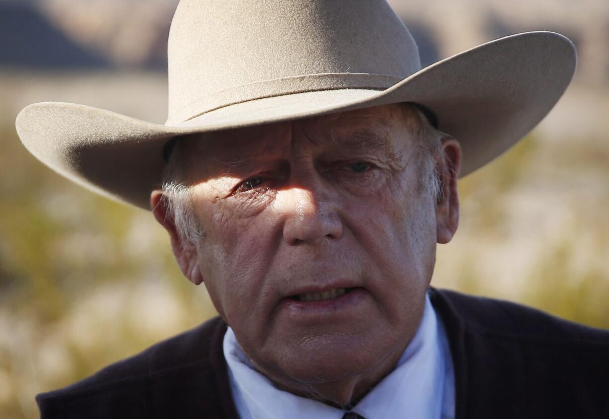 Rancher Cliven Bundy stands along the road near his ranch in Bunkerville, Nev. Bundy, the father of the jailed leader of the Oregon refuge occupation, and who was the center of a standoff with federal officials in Nevada in 2014, was arrested in Portland on Feb. 10.