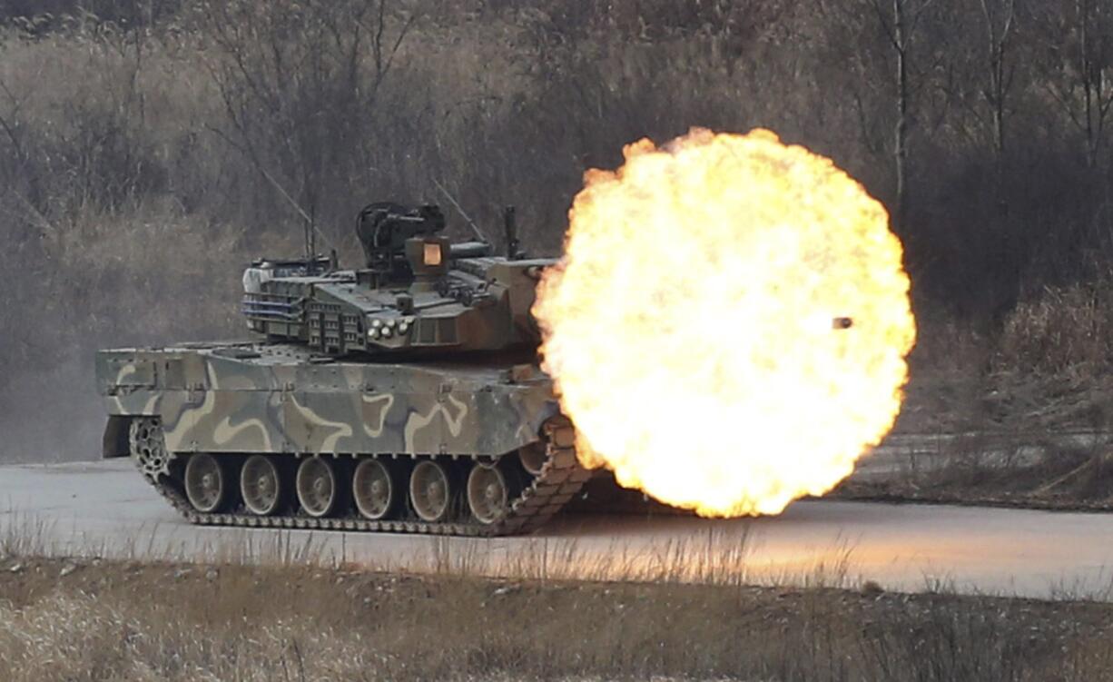 A South Korean army K-2 tank fires during a live firing drill Thursday at a training field in Yangpyeong, South Korea.