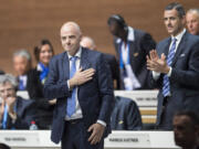 Gianni Infantino, the new FIFA President, of Switzerland receives applause  during the Extraordinary FIFA Congress 2016   in Zurich, Switzerland, Friday, February 26, 2016. Gianni Infantino of Switzerland is the new FIFA president after winning a second-round vote. Infantino got 115 of the 207 eligible votes to take a decisive majority ahead of Sheikh Salman of Bahrain.