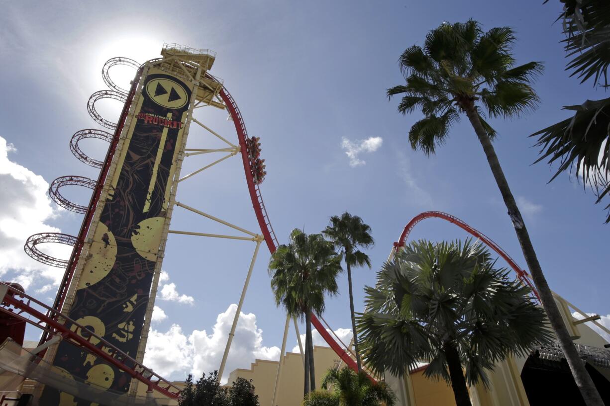 Guests ride the Hollywood Rip Ride Rocket roller coaster at Universal Studios in Orlando, Fla. In the last 25 years, Universal Orlando has emerged from the shadow of its older sister park to forge its own identity celebrating the entertainment industry.