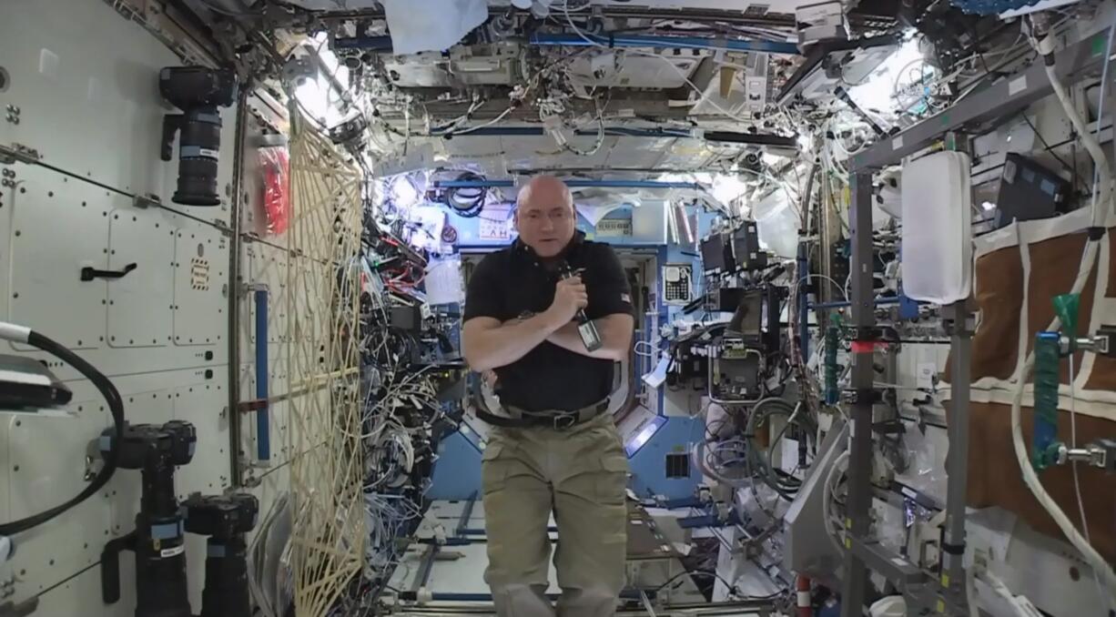 Astronaut Scott Kelly speaks to reporters on Earth during a news conference Thursday from the International Space Station. Kelly is just a few days away from returning to Earth.