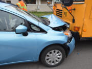 Vancouver police traffic detectives are investigating a head-on collision between a vehicle and a school bus that happened Wednesday morning. No children were seriously injured.