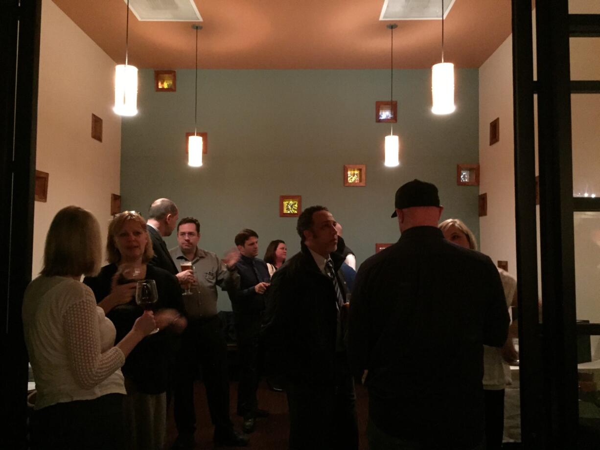 A crowd of Evergreen school supporters gathers to hear the election results at Vinotopia in East Vancouver on Tuesday.