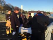 Medical personnel treated an 80-year-old Dolores Fake who was found Tuesday morning in a vehicle found in the soccer field at Ridgefield High School. Fake was reported missing Monday night.