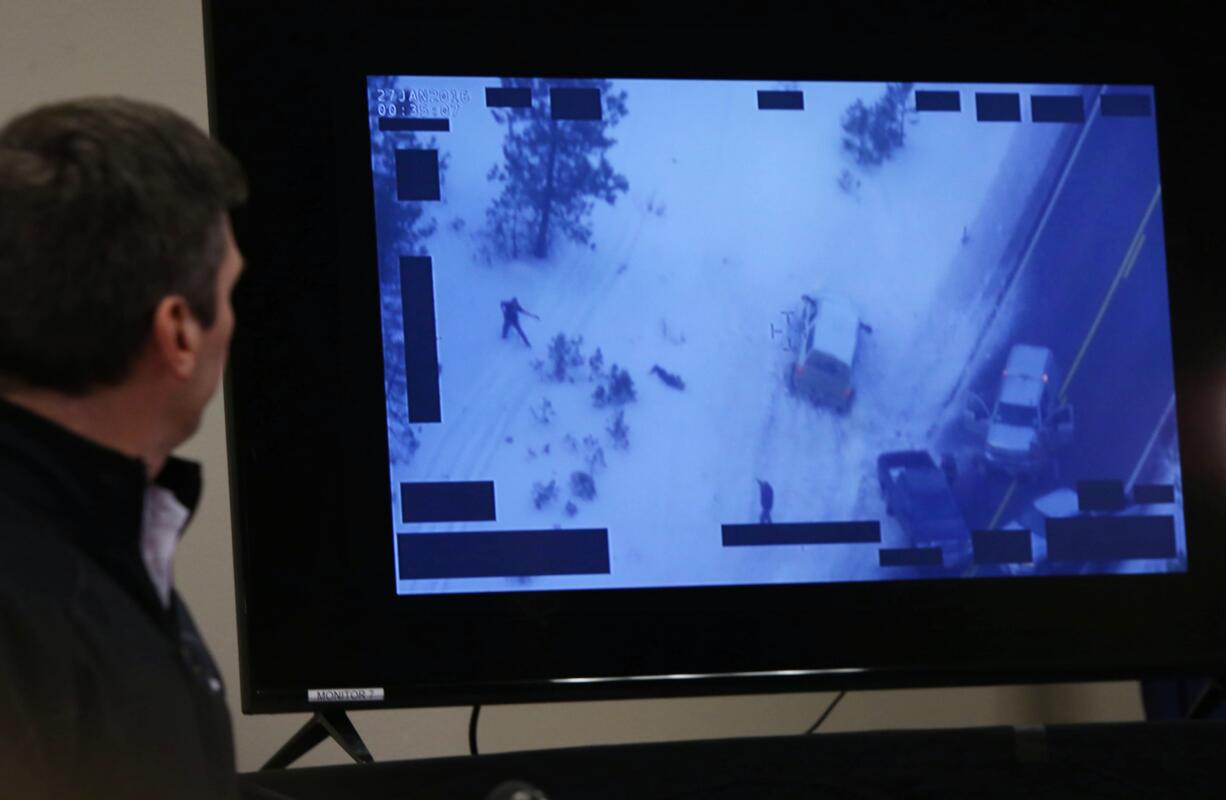 At a Jan. 28 press conference in Burns, Ore., FBI Portland Special Agent in Charge Greg Bretzing presents a video of the Jan. 26 shooting of Robert &quot;LaVoy&quot; Finicum, left on the monitor, a spokesman for the armed occupiers of the Malheur National Wildlife Refuge.