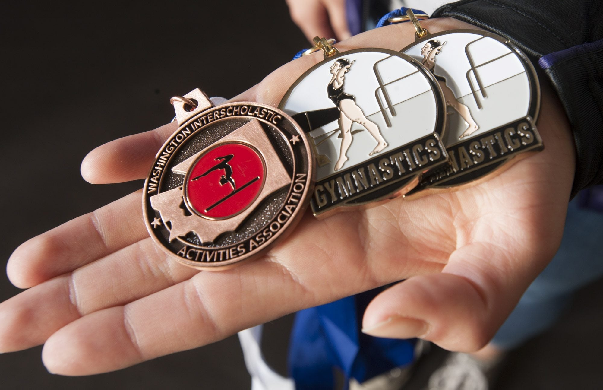 Columbia River&#039;s Sarah Ellis shows her medals in Vancouver Monday March 14, 2016. Ellis is the All-Region gymnast of the year.