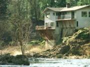 Bob and Pat Jones live in a house built on the concrete foundation of the old power plant from the hydroelectric dam on the Washougal River, which was blown up in 1947.