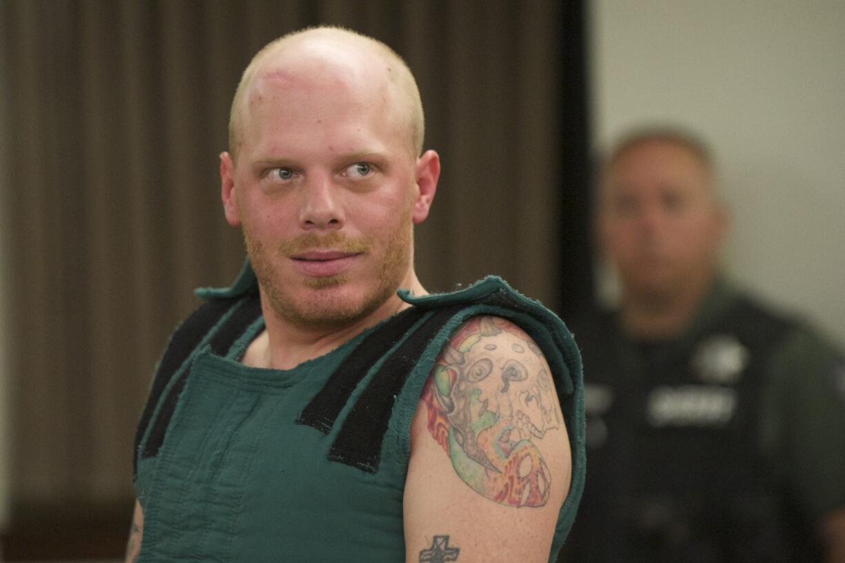 Vincent R. Burnett of Vancouver appears in Clark County Superior Court on May 4 after allegedly breaking into an east Vancouver home, and attacking and robbing the woman who lived there. He pleaded guilty Tuesday to first-degree assault, first-degree robbery and unlawful imprisonment.