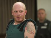 Vincent R. Burnett of Vancouver appears in Clark County Superior Court on May 4 after allegedly breaking into an east Vancouver home, and attacking and robbing the woman who lived there. He pleaded guilty Tuesday to first-degree assault, first-degree robbery and unlawful imprisonment.