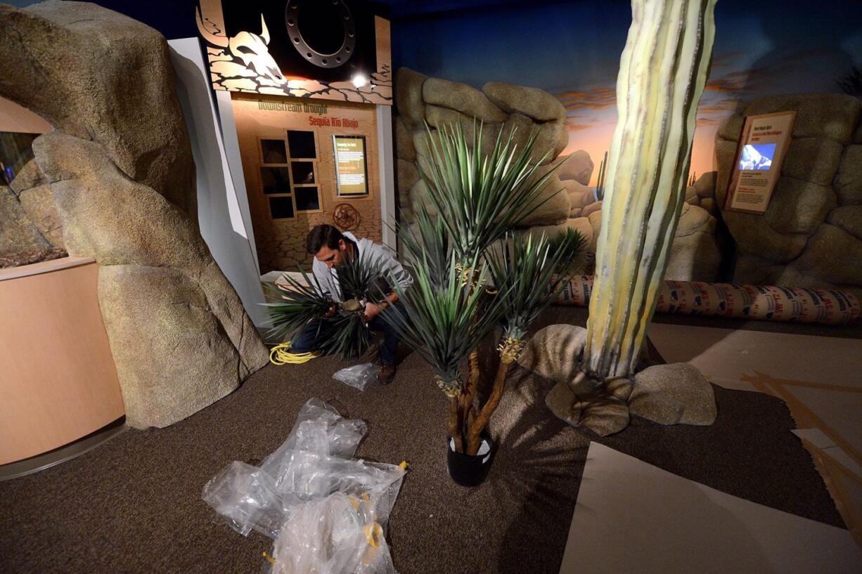 Curator of Fish and Invertebrates Scott Greenwald works on one of the areas housing the new exhibit called &quot;Viva Baja&quot; at the Monterey Bay Aquarium in Monterey, Calif.