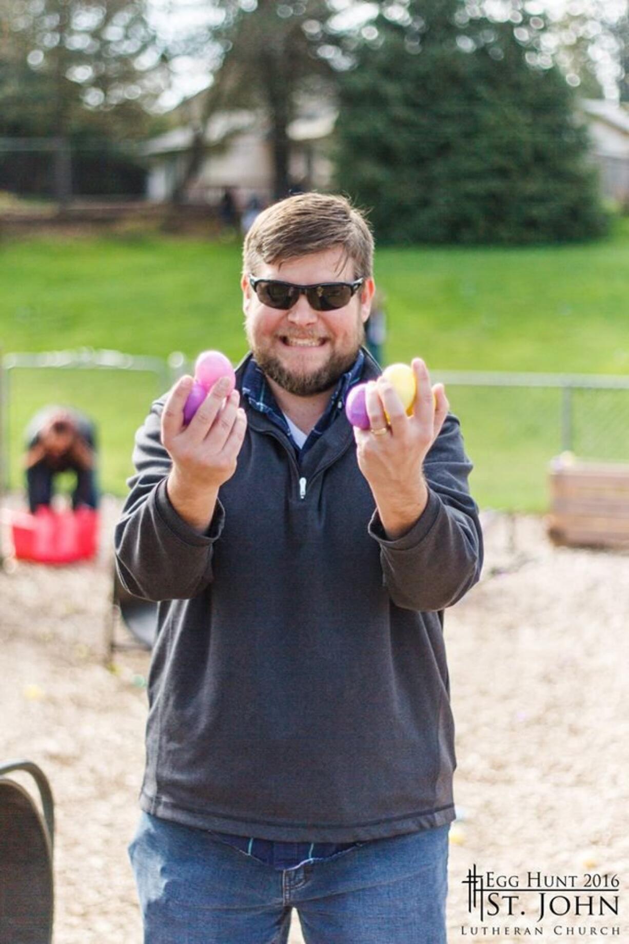 Hazel Dell: Pastor Brian Larsen gets in on the Easter egg hunt fun at St. John Lutheran Church.