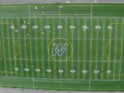 Woodland used this photo taken from a drone to check out the installation of its new football field, including placement of the newly designed &quot;W&quot; logo at the center of the field.