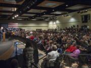 President Bill Clinton speaks at Gaiser Hall at Clark College in Vancouver on Monday. Clinton spoke in Vancouver and Spokane to urge people to caucus for his wife and presidential hopeful, Hillary Clinton.