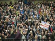 Supporters of Democratic presidential candidate Bernie Sanders cheer at the candidate&#039;s rally at Hudson&#039;s Bay High School in Vancouver on Sunday. Sanders urged the crowd to vote in next Saturday?s Democratic caucuses.