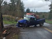 A man was hospitalized after this truck rammed into a tree north of Ridgefield Monday afternoon.