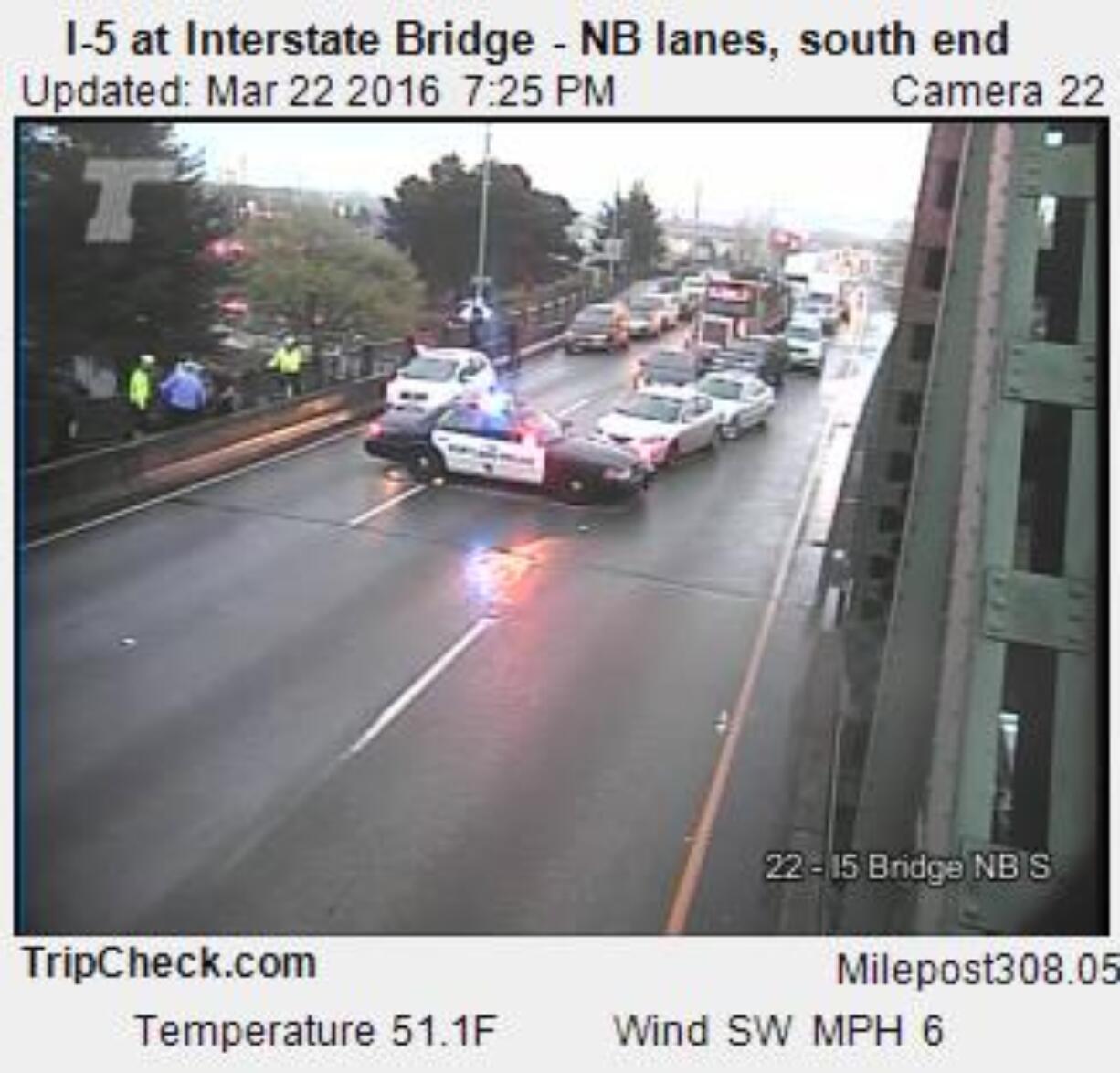 Officials blocked both directions of the highway over the Interstate 5 bridge Tuesday night as police tried to negotiate with a man threatening to jump.