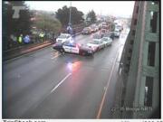 Officials blocked both directions of the highway over the Interstate 5 bridge Tuesday night as police tried to negotiate with a man threatening to jump.