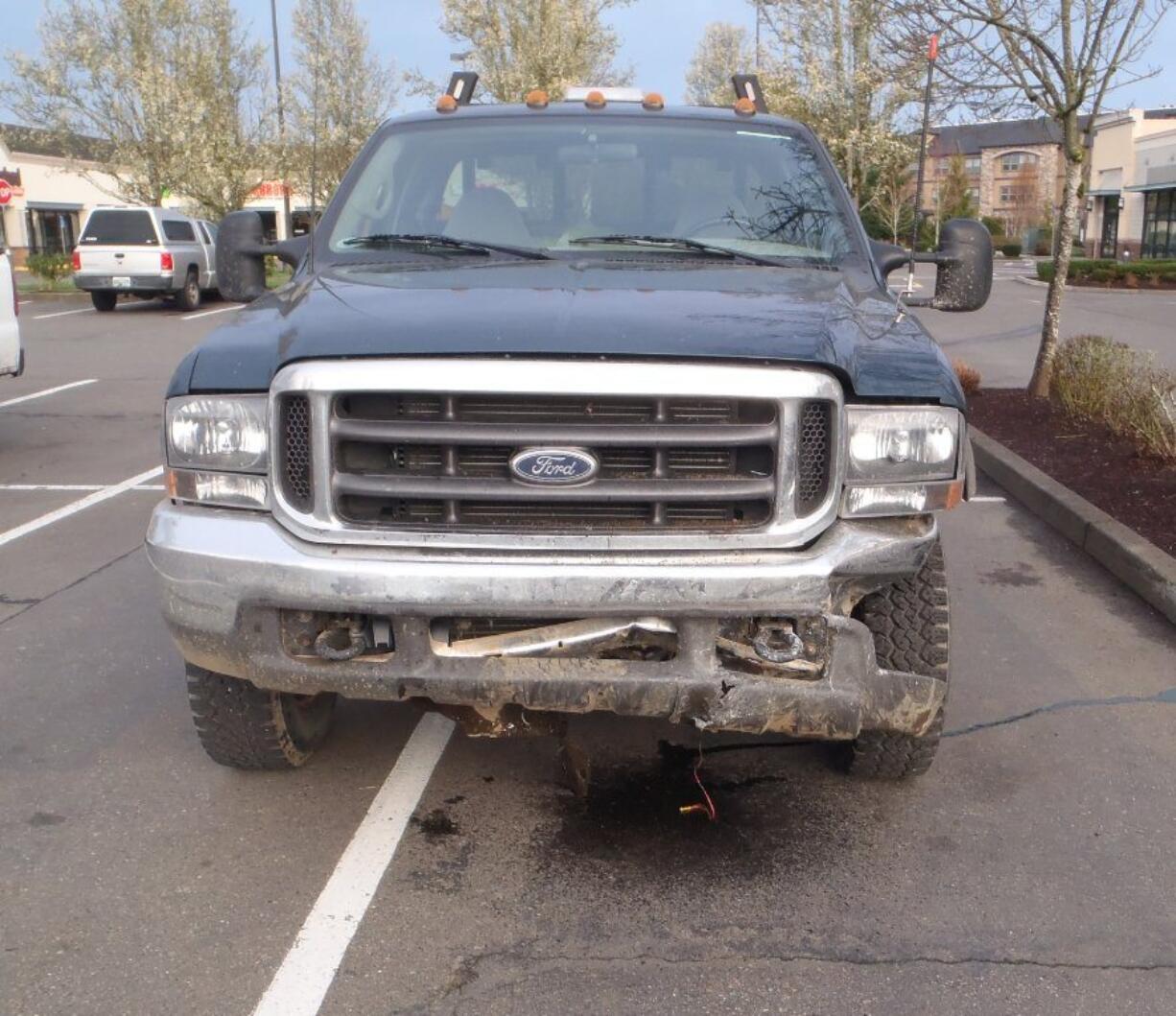 A Vancouver woman was booked Friday morning for driving under the influence in Sherwood, Ore., after crashing into this pickup and blowing a 0.17 blood alcohol content in a breathalyzer test. No one was hurt.