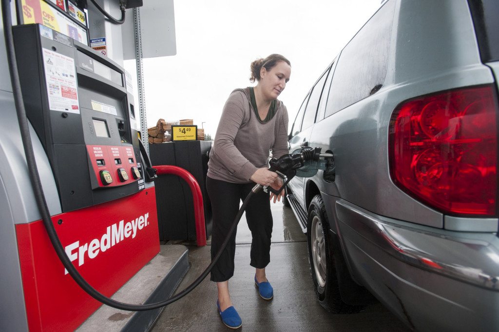 Cathy Hadley fills up her tank at a Vancouver Fred Meyer.