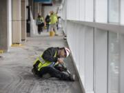 Mark Adams of Adams Interiors heat seals the chemical-resistant floor outside the chemical storage room in the new STEM Building on Thursday morning at Clark College.