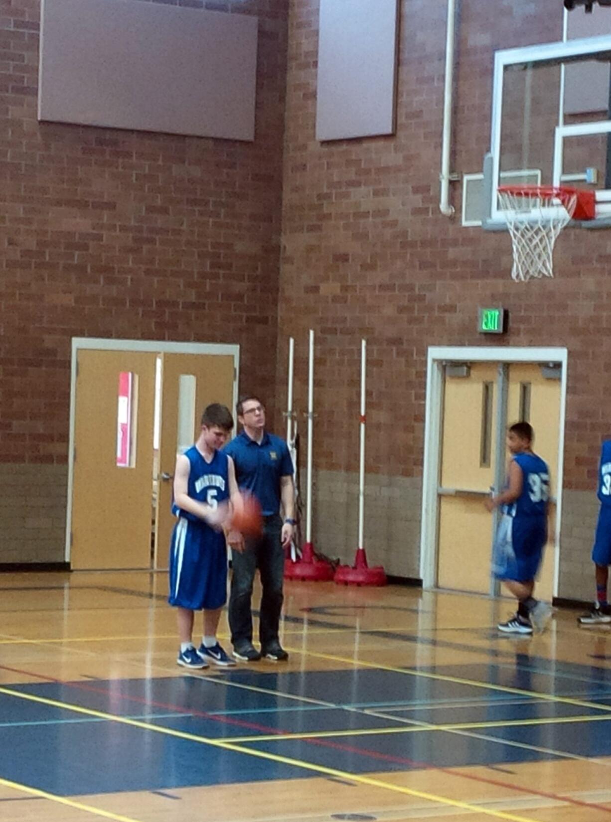 Mountain View Neighborhood: Christopher warming up with coach Jeremy Hanson.