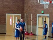 Mountain View Neighborhood: Christopher warming up with coach Jeremy Hanson.