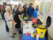 A crowd inspects emergency disaster kits Thursday at the Washington State University Vancouver campus.