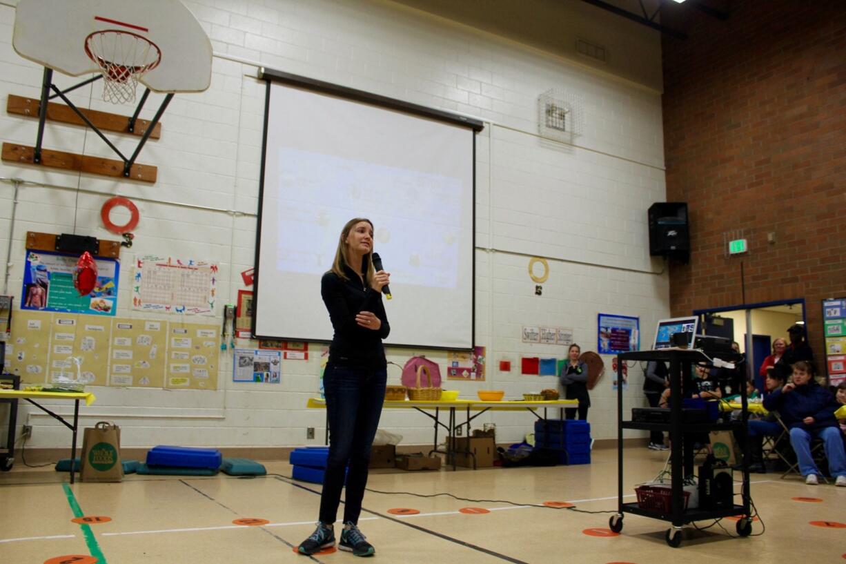 Airport Green: Colin O'Brady's fiance, Jenna, gives students an update on his progress during "Breakfast and Beyond event.