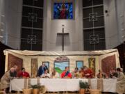 Members of the First United Methodist Church in Vancouver pose in the exact positions Wednesday as the figures in Leonardo da Vinci&#039;s The Last Supper painting during a dress rehearsal for Maundy Thursday.