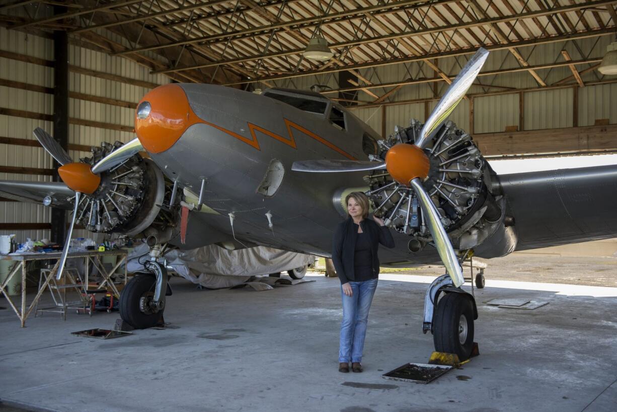 Sally Runyan, who owns and runs Green Mountain Airport in the Orchards area, owned this historic 1936 Lockheed 12A twin-engine plane for 13 years. She sold the plane to a private collector in France, and it is set to depart for Europe on Friday.