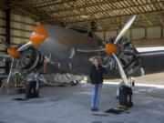 Sally Runyan, who owns and runs Green Mountain Airport in the Orchards area, owned this historic 1936 Lockheed 12A twin-engine plane for 13 years. She sold the plane to a private collector in France, and it is set to depart for Europe on Friday.