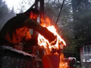 Dave Deal fires &quot;Egret Ewer&quot; in his kiln.