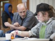 Adam Kravitz, left, speaks with Kilo Ulestad at an Unhoused Residents Association meeting. &quot;We are all experts of what&#039;s not working. That&#039;s why we&#039;re here,&quot; said Kravitz, who used to be homeless.