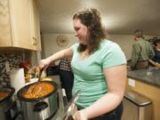 Tara Bouma prepares soup for a neighborhood gathering in Vancouver&#039;s Northwest neighborhood.