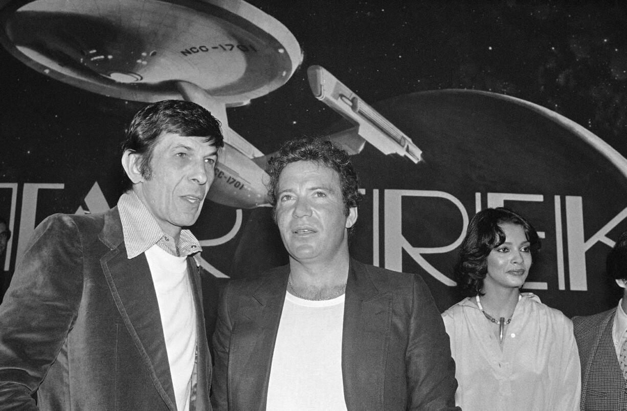 William Shatner, center, and Leonard Nimoy, left, attend a Paramount Studio press conference about the new &quot;Star Trek&quot; movie in 1976.