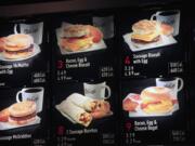 Items on the breakfast menu, including the calories, are posted at a McDonald&#039;s restaurant in New York.