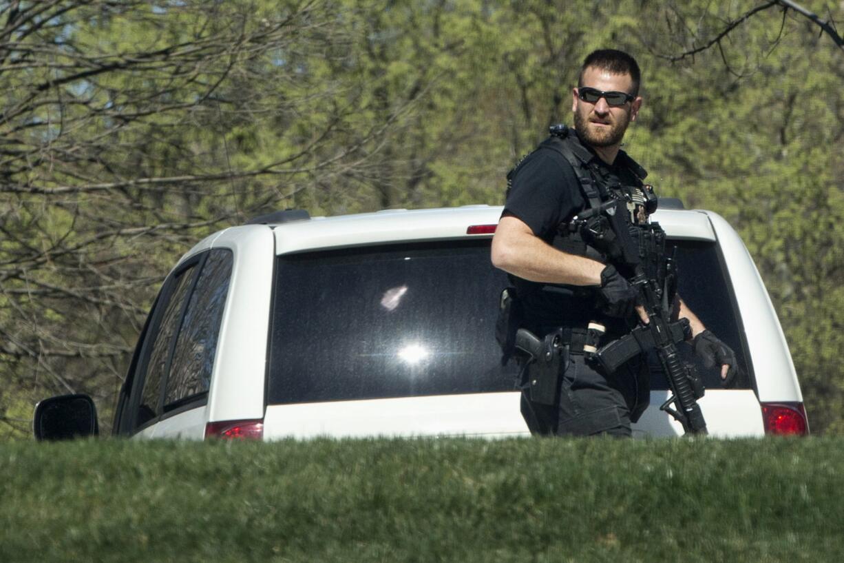 A Secret Service Police Officer patrols the North Lawn of the White House in Washington on Monday after reports of an active shooter at the U.S. Capitol. A U.S. Capitol Police officer was shot and injured Monday, March 28, 2016,  at the Capitol Complex. The officer was not seriously injured and the shooter was caught and is in custody, Capitol officials said.