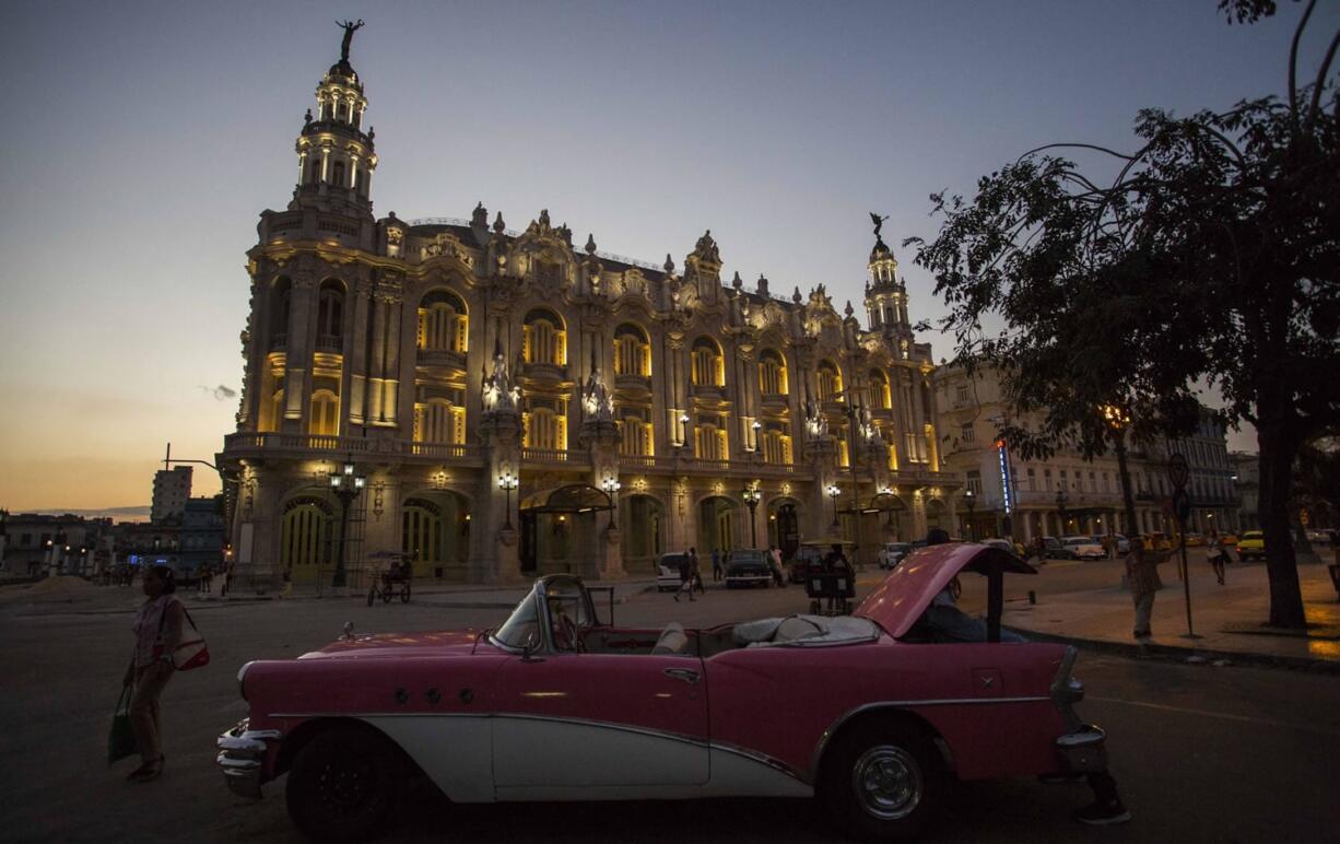 A classic American convertible sits parked outside the National Theatre where U.S. President Barack Obama is expected to speak during his upcoming trip, in Havana, Cuba, on Monday. Obama will travel to Cuba on March 20 for a trip that will mark a watershed moment in U.S.-Cuba relations, making Obama the first sitting U.S. president to set foot on the island in nearly seven decades.