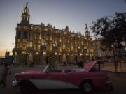 A classic American convertible sits parked outside the National Theatre where U.S. President Barack Obama is expected to speak during his upcoming trip, in Havana, Cuba, on Monday. Obama will travel to Cuba on March 20 for a trip that will mark a watershed moment in U.S.-Cuba relations, making Obama the first sitting U.S. president to set foot on the island in nearly seven decades.