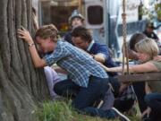 Jennifer Garner, from left, Martin Henderson and Kelly Collins Lintz appear in a scene from Sony Pictures&#039; &quot;Miracles From Heaven,&quot; which is in theaters this week.