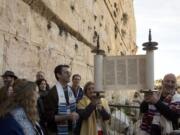 American Reform Rabbi Zachary Shapiro, center left, and other American and Israeli Reform rabbis pray Feb. 25 in the Western Wall, the holiest site where Jews can pray in Jerusalem&#039;s old city.