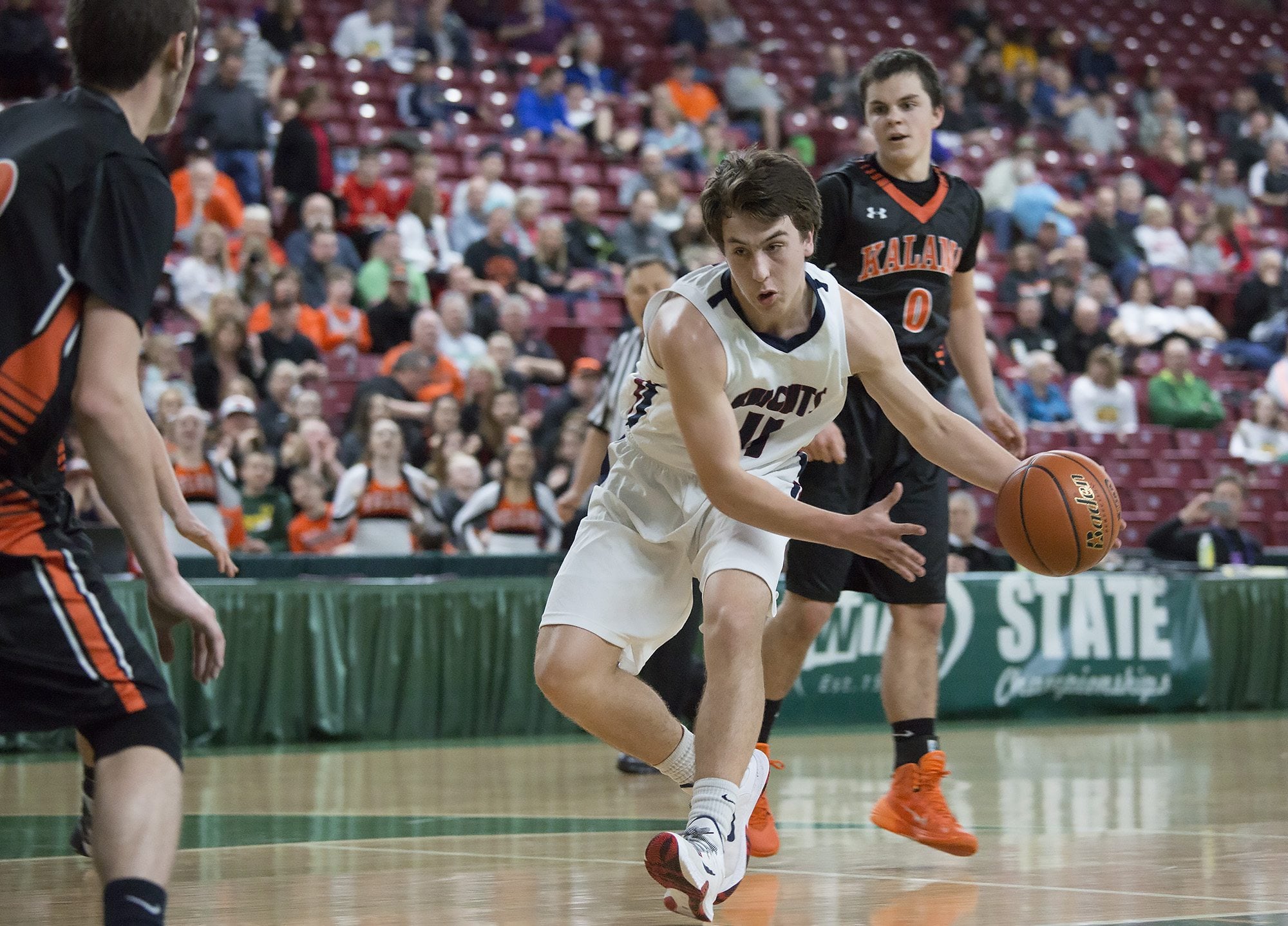 King’s Way Christian High School’s Karter Graves drives to the basket in the second half of King’s Way’s game against Kalama High School in the boys’ class 1A state basketball tournament March 5, 2016 in the Yakima SunDome in Yakima, Wash. Kalama won the game 56-41.