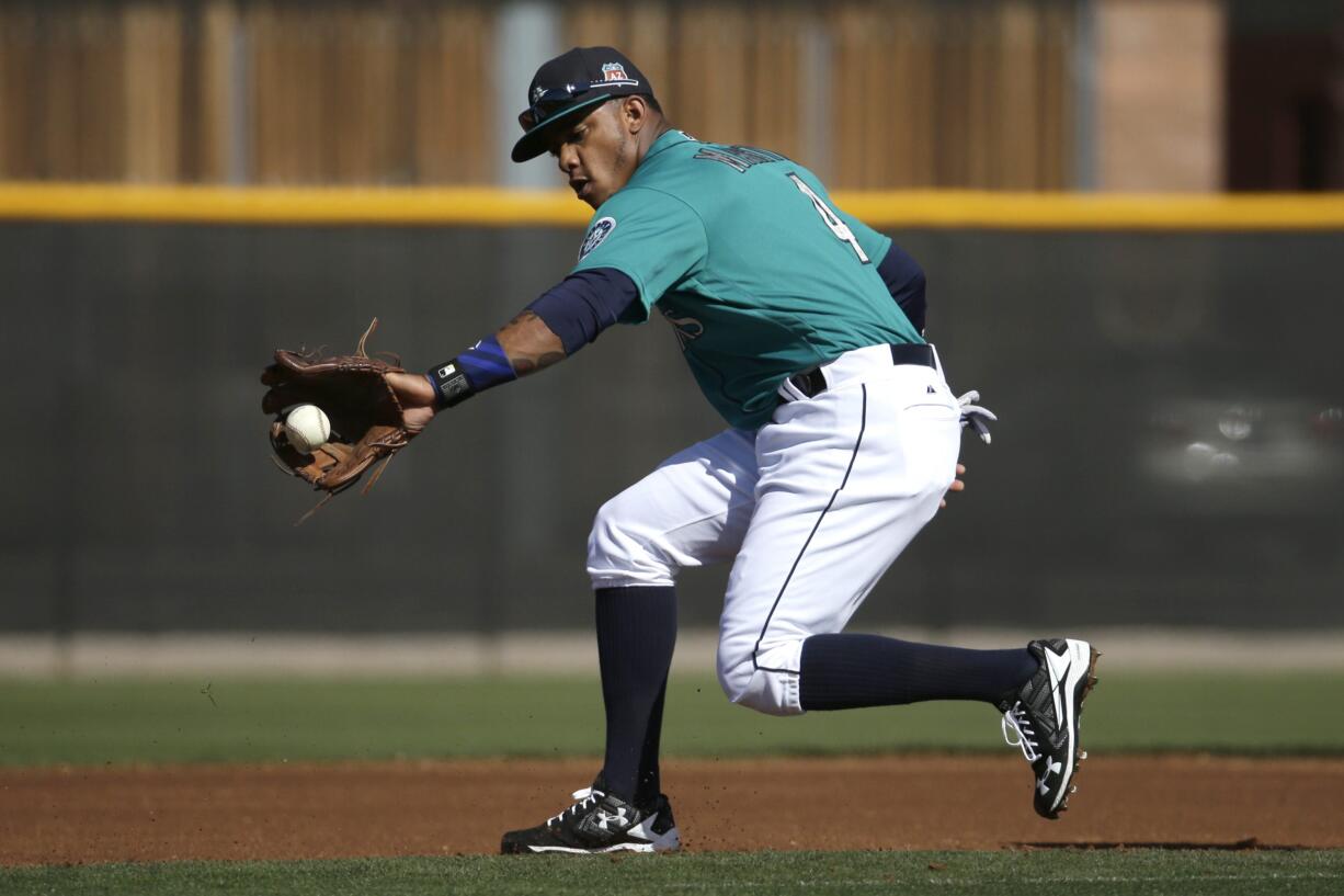 FILE - In this Feb. 26, 2016, file photo, Seattle Mariners&#039; Ketel Marte fields a ball during spring training baseball practice, in Peoria, Ariz. Marte showed enough last season that even the new Seattle Mariners coaching staff believed he could be their shortstop of the future.