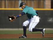 FILE - In this Feb. 26, 2016, file photo, Seattle Mariners&#039; Ketel Marte fields a ball during spring training baseball practice, in Peoria, Ariz. Marte showed enough last season that even the new Seattle Mariners coaching staff believed he could be their shortstop of the future.