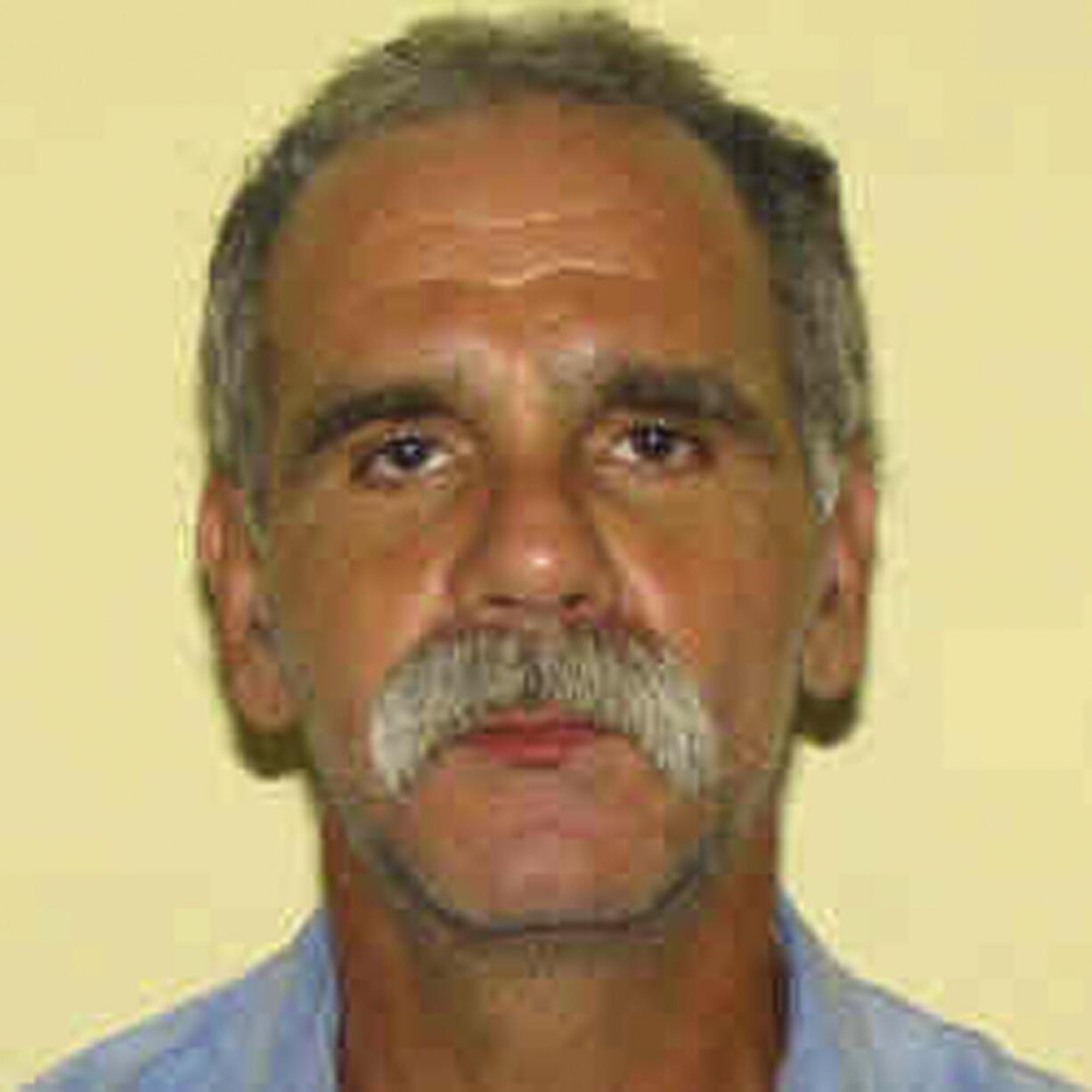 This undated photo shows provided by the Ohio Department of Rehabilitation and Corrections shows John Modie. The Ohio Department of Rehabilitation and Correction on Monday, March 28, 2016, confirmed the possible escape of Modie, convicted of killing a woman in Cleveland, from the Hocking Unit of the Southeastern Correctional Complex in Nelsonville. The department says Modie was found to be missing during the 11:00 p.m. count of inmates Sunday night.