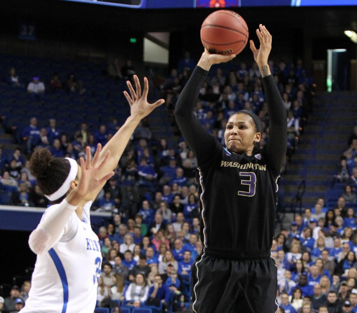 Washington's Talia Walton (3) shoots while defended by Kentucky's Alexis Jennings during a third round women's college basketball game in the NCAA Tournament in Lexington, Ky., Friday, March 25, 2016.