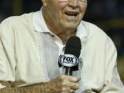 Arizona Diamondbacks broadcaster Joe Garagiola speaks April 14, 2013, during a pregame show prior to a baseball game against the Los Angeles Dodgers, in Phoenix. Former big league catcher and popular broadcaster Joe Garagiola has died. He was 90. The Arizona Diamondbacks say Garagiola died Wednesday. He had been in ill health in recent years. (AP Photo/Ross D.