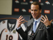 Denver Broncos quarterback Peyton Manning speaks during his retirement announcement at team headquarters Monday, in Englewood, Colo. Manning, who has been in the NFL for the past 18 years, is retiring after winning five MVP trophies and two Super Bowl championships, the most recent last month against the Carolina Panthers.