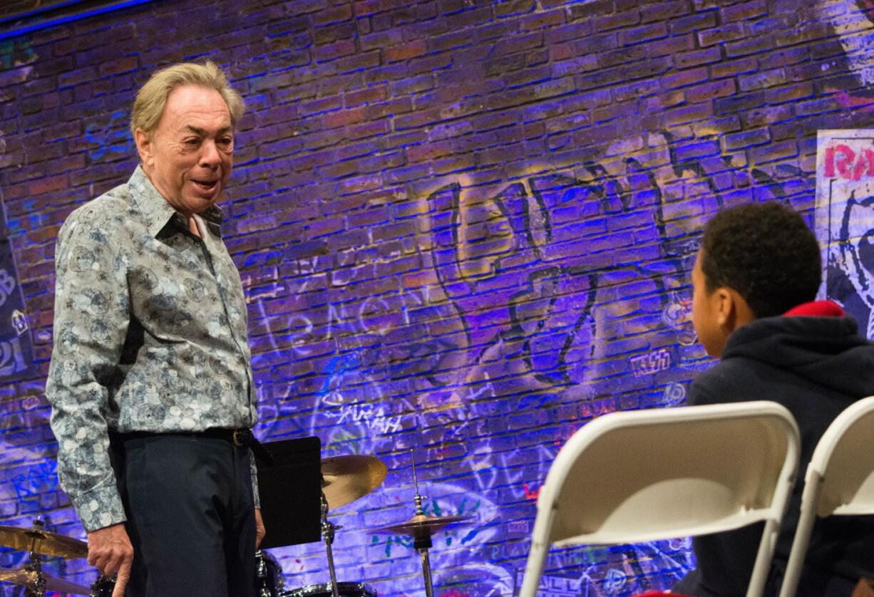 Andrew Lloyd Weber speaks with a youngster during an open audition for the musical &quot;The School of Rock.&quot; Last week,creators of the show held open auditions that drew a few hundred kids ages 9-12 to the Winter Garden Theatre stage.